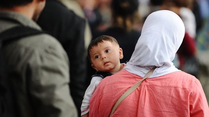 &nbsp; (Famille arrivant à Munich ce mardi © Maxppp)