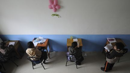 Des enfants dans un orphelinat de Fuyang (Chine), le 19 novembre 2011. (REUTERS)