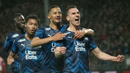 L'attaquant de l'Olympique de Marseille Arkadiusz Milik célèbre son but à Brest, le 13 mars 2022 en Ligue 1 (LOIC VENANCE / AFP)