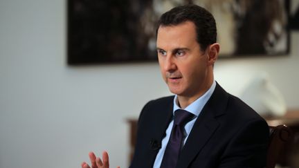 Le président syrien Bachar Al-Assad lors d'un entretien à l'AFP, jeudi 11 février 2016 à Damas (Syrie). (JOSEPH EID / AFP)