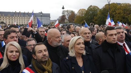 Marine Le Pen, Jordan Bardella et Sébastien Chenu, du Rassemblement national, lors de la marche contre l'antisémitisme à Paris, le 12 novembre 2023. (GEOFFROY VAN DER HASSELT / AFP)