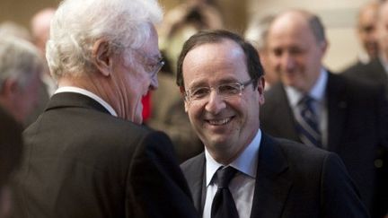 Lionel Jospin et François Hollande (en mars 2012) (FRED DUFOUR / AFP)