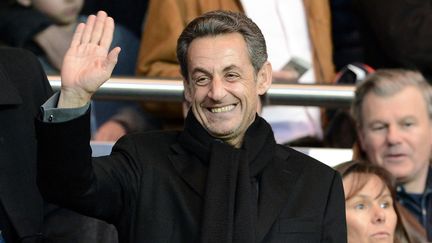 Nicolas Sarkozy dans les tribunes du&nbsp;Parc des Princes lors d'un match du PSG, le 21 avril 2013, &agrave; Paris. (FRANCK FIFE / AFP)