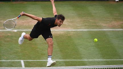 L'Autrichien Dominic Thiem à la volée (MARIJAN MURAT / DPA)