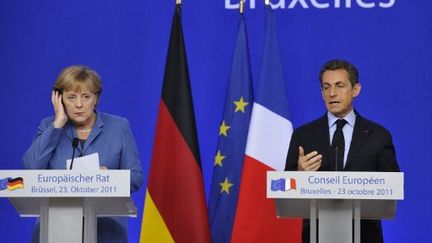 Nicolas Sarkozy et Angela Merkel sont parvenus à un accord (Ici au sommet de Bruxelles le dimanche 23 octobre) (ERIC FEFERBERG / AFP)