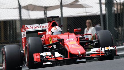 Sebastian Vettel (Ferrari) dans les rues de Monaco (BORIS HORVAT / AFP)