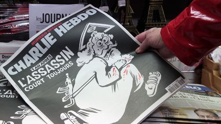 Le numéro 1224 de Charlie Hebdo publié un an après les attentats de janvier
 (J.Demarthon / AFP)