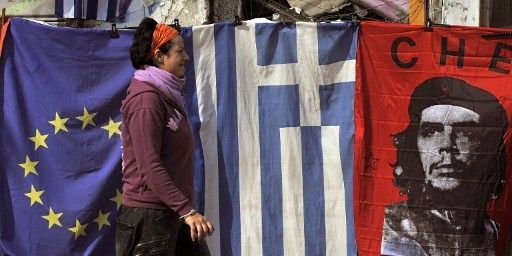 La présidence grecque de l'UE va se tenir dans un climat tendu, avec une population exaspérée par les mesures décidées à Bruxelles. (LOUISA GOULIAMAKI / AFP)