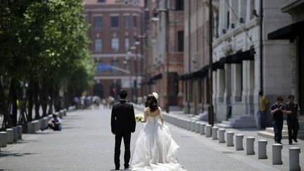 A Shanghai, des couples, même heureux, divorcent pour mieux investir dans l'immobilier (EUGENE HOSHIKO/AP/SIPA / AP)