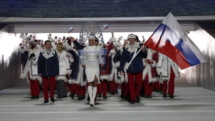 Les athlètes russes défilent lors de la cérémonie d'ouverture des Jeux de Sotchi (Russie), le 7 février 2014. (PHIL NOBLE / REUTERS)