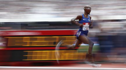 L'athlète anglais Mo Farah lors d'une épreuve de 5000 m à Londres le 23 juillet 2016. (ADRIAN DENNIS / AFP)