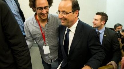 François Hollande et son fils Thomas (BERTRAND LANGLOIS / AFP)