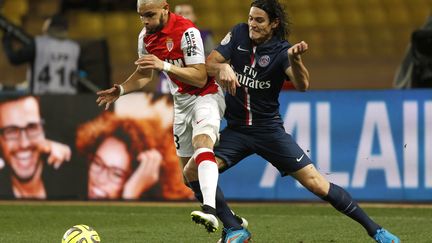 Layvin Kurzawa au duel avec Edinson Cavani lors de Monaco-PSG (saison 2014-2015). (PHILIPPE LAURENSON / BLUEPIX)