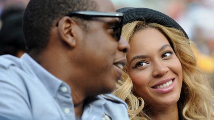 Beyoncé a le regard de l'amour pour son époux Jay-Z.
 (Stan Honda / AFP)