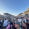 Le public envahit la piste Bugatti du circuit des 24 heures du Mans, après la fin du GP Explorer 2, remporté par Depielo. (THEO UHART / FRANCEINFO / RADIOFRANCE)