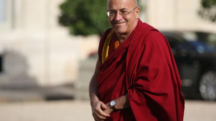 Le moine bouddhiste Matthieu Ricard arrive &agrave; l'Elys&eacute;e, le 21 septembre 2013. (KENZO TRIBOUILLARD / AFP)