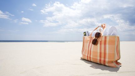 De nombreux services web permettent de pr&eacute;parer ses vacances aussi facilement qu'un sac de plage. (JACK FLASH / DIGITAL VISION / GETTY IMAGES)