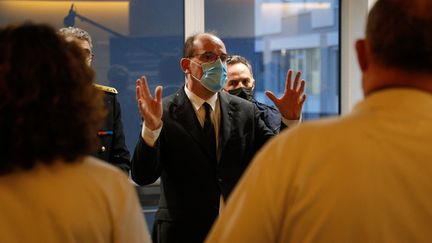 Le Premier ministre Jean Castex, en déplacement à l'hôpital de la Pitié-Salpêtrière (Paris), le 12 mars 2021. (GEOFFROY VAN DER HASSELT / AFP)