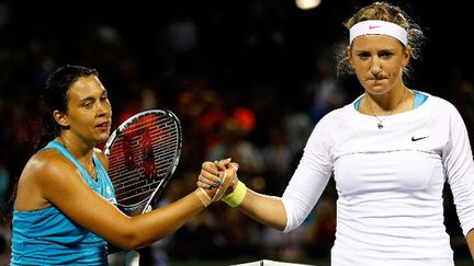 Marion Bartoli (à gauche) et Victoria Azarenka (à droite)