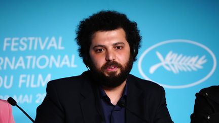 Le réalisateur iranien Saeed Roustaee au Festival de Cannes, le 26 mai 2022. (CLEMENS BILAN / POOL / EPA POOL)