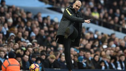 Pep Guardiola. (OLI SCARFF / AFP)