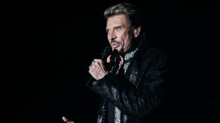 Johnny Hallyday à Bercy à Paris le 29 septembre 2006 (FRED DUFOUR / AFP)