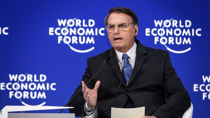 Le président brésilien Jair Bolsonaro pendant son discours au forum économique de Davos, en Suisse, le 22 janvier 2019. (FABRICE COFFRINI / AFP)