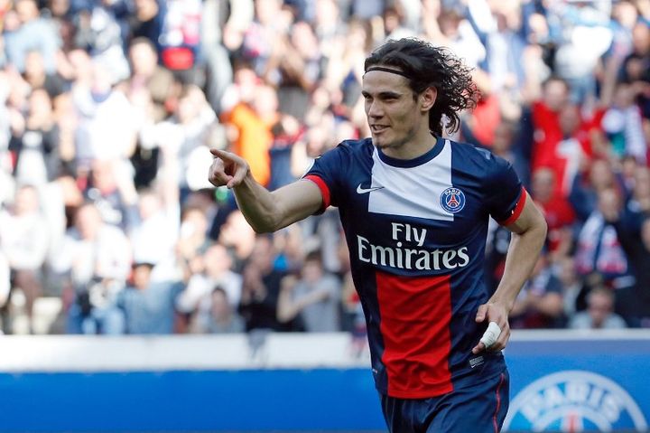 L'avant-centre parisien Edinson Cavani c&eacute;l&egrave;bre son but contre Reims, samedi 5 avril 2014 au Parc des Princes (Paris). (THOMAS SAMSON / AFP)