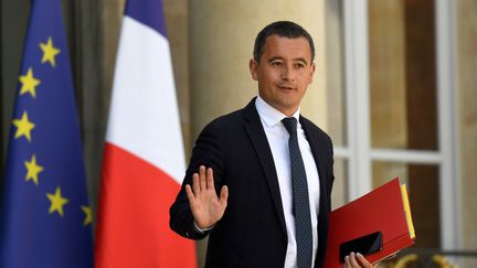 Le ministre de l'Action et des Comptes publics Gérald Darmanin quitte l'Elysée, à Paris, le 18 juillet 2018. (BERTRAND GUAY / AFP)