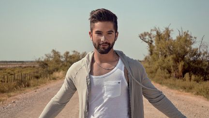 Extrait de la pochette du premier album de Kendji Girac
 (Kendji Girac )