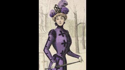 Robe en veloutine violet prélat : jupe ornée de deux bandes de velours plus foncé, corsage-justaucorps, trèfles en velours placés sur le corsage et la jupe en guise de brandebourgs, col Médicis. La Mode illustrée, 1898.
 (Guénolée Milleret. Edition Eyrolles)