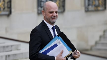 Le ministre de l'Education nationale, Jean-Michel Blanquer, à l'Elysée, le 15 décembre 2021.&nbsp; (LUDOVIC MARIN / AFP)