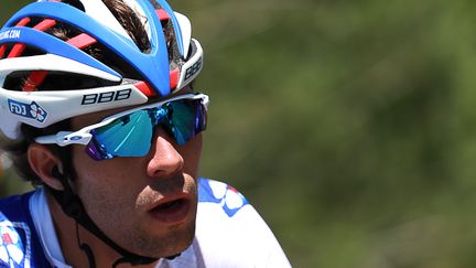 Thibaut Pinot en souffrance sur la première étape de haute montagne (KENZO TRIBOUILLARD / AFP)