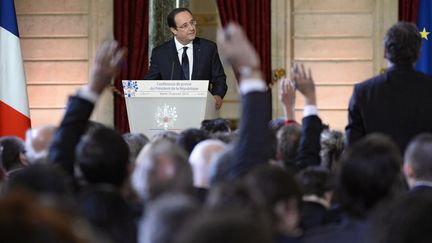 Fran&ccedil;ois Hollande face aux journalistes &agrave; l'Elys&eacute;e, &agrave; Paris, le 14 janvier 2014. (ALAIN JOCARD / AFP)