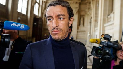 L'ancien avocat Karim Achoui au palais de justice de Paris, le 17 septembre 2013.&nbsp; (MAXPPP)