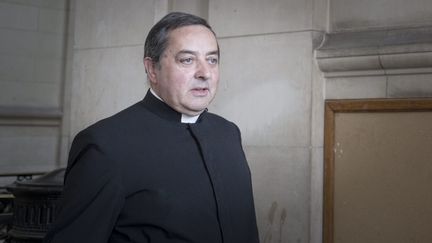 L'abb&eacute; Xavier Beauvais au palais de justice de Paris, le 25 mars 2015. (  MAXPPP)