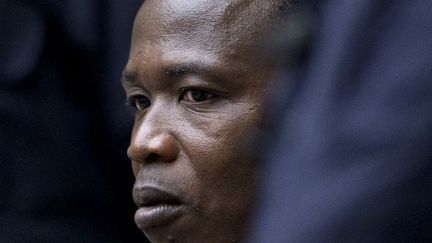 L'ancien commandant de l'Armée de résistance du Seigneur (LRA) Dominic Ongwen face aux juges de la Cour pénale internationale (CPI), le 6 décembre 2016 à La Haye (Pays-Bas). (PETER DEJONG / ANP / AFP)