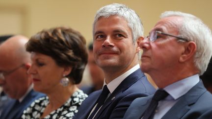 Le président des Républicains, Laurent Wauquiez (au centre), son vice-président délégué, Jean Leonetti (à dr.), et sa secrétaire générale, Annie Genevard (à g.), lors du conseil&nbsp;national du parti, le 20 juin 2018 à Menton (Alpes-Maritimes). (VALERY HACHE / AFP)