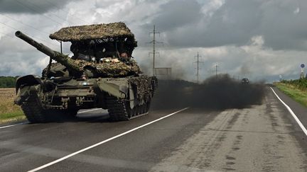 A Russian tank near the town of Sudja, a town of about 5,500 people located about ten kilometers from the border with Ukraine, on August 8, 2024. (ANATOLIY ZHDANOV / KOMMERSANT PHOTO / AFP)