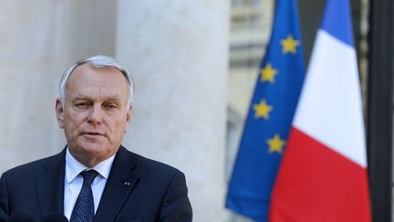 Le Premier ministre Jean-Marc Ayrault sur le perron de l'Elys&eacute;e, &agrave; Paris, le 30 ao&ucirc;t 2013.&nbsp; (FRANCOIS GUILLOT / AFP)