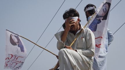 &nbsp; (Manifestation de soutien à un condamné, Mumtaz Qadri accusé d'avoir tué un gouverneur, à Rawalpindi en 2011  © REUTERS/Faisal Mahmood)