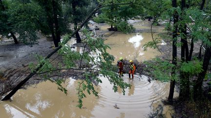 Des orages et des fortes pluies se sont abattues jeudi sur le Centre-Est et le Sud-Est de la France, nécessitant des évacuations de campings et colonie de vacances dans le nord du Gard où un Allemand est porté disparu.  (BORIS HORVAT / AFP)