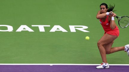 Marion Bartoli s'est qualifiée pour le deuxième tour du Tournoi de Doha (KARIM JAAFAR / AFP)