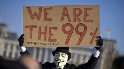 Un manifestant du mouvement "Occupy Wall Street" &agrave; Berlin (Allemagne), le 12 novembre 2011. (SIPA)