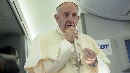 &nbsp; (Le pape François à bord de l'avion qui le ramène à Rome © Filippo Monteforte/AP/SIPA)