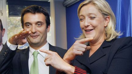 Marine Le Pen, candidate du Front national &agrave; la pr&eacute;sidentielle, et Florian Philippot, son directeur strat&eacute;gique de campagne, le 6 octobre 2011 &agrave; Nanterre (Hauts-de-Seine). (JACQUES BRINON / AP / SIPA)