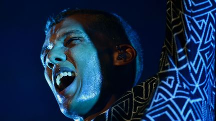 Stromae en concert au&nbsp;Best Buy Theater de New York (Etats-Unis), le 20 juin 2014. (STAN HONDA / AFP)