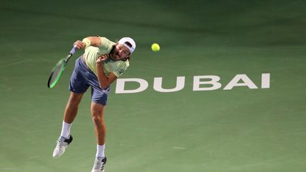 Lucas Pouille à Dubaï (KARIM SAHIB / AFP)