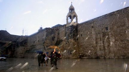 La basilique de la Nativité sous la pluie (20/12/2002)
 (Musa Al-Shaer / AFP)