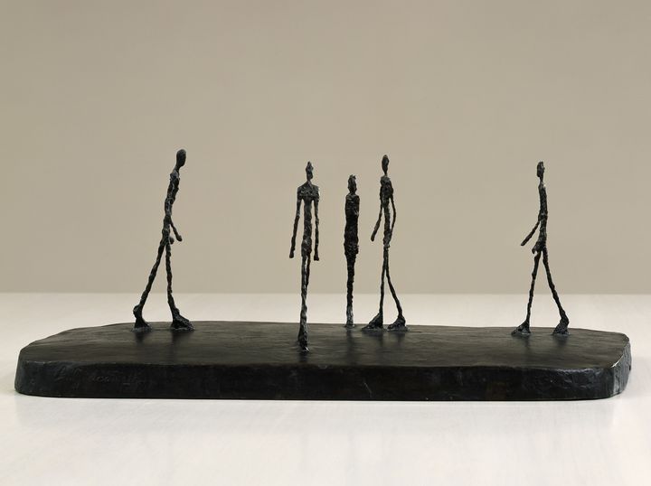 Alberto Giacometti, "La Place II", 1948-1949. (BPK / NATIONALGALERIE SMB MUSEUM BERGGRUEN / JENS ZIEHE / SUCCESSION  ALBERTO GIACOMETTI ADAGP PARIS 2024)